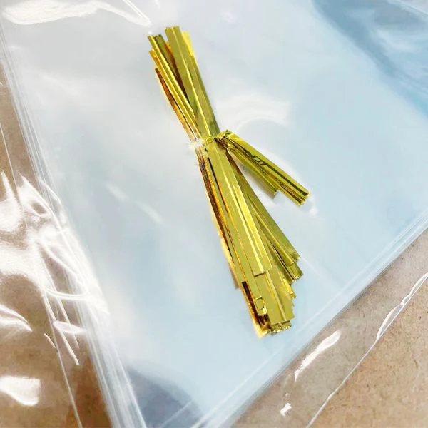 25 Pack Triangle Plastic Bags with Gold Tie - 13cm x 25cm - Image 2